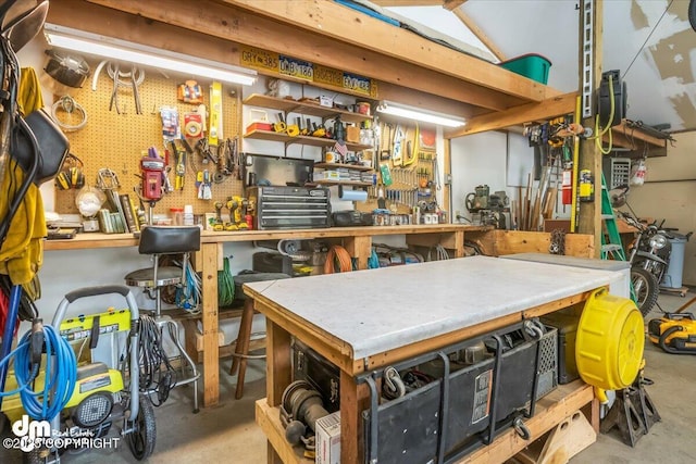 20838 Helluva St, Chugiak, AK 99567 - misc room featuring a workshop area and unfinished concrete flooring