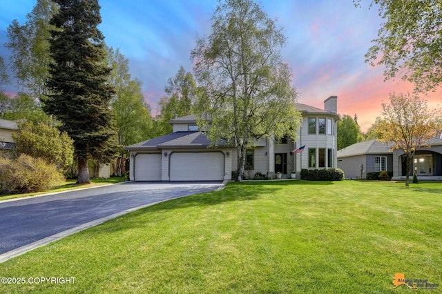 740 Botanical Heights Cir, Anchorage, AK 99515 - view of front of home featuring driveway, an attached garage, a chimney, and a yard