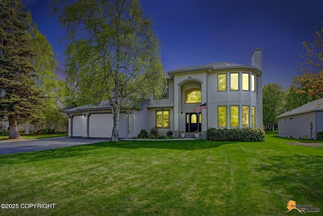 740 Botanical Heights Cir, Anchorage, AK 99515 - view of front of home featuring asphalt driveway, a chimney, a garage, and a front lawn