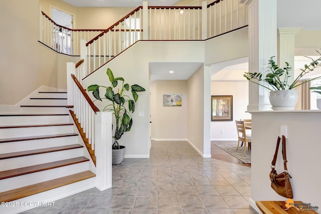 740 Botanical Heights Cir, Anchorage, AK 99515 - stairway with a towering ceiling and baseboards