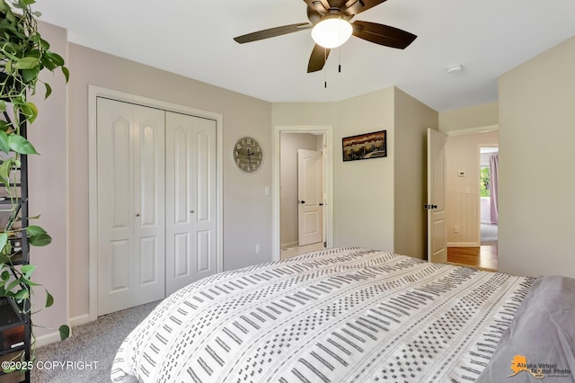 740 Botanical Heights Cir, Anchorage, AK 99515 - bedroom featuring a closet, carpet, a ceiling fan, and baseboards