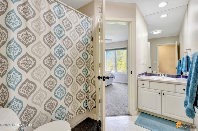 740 Botanical Heights Cir, Anchorage, AK 99515 - bathroom featuring vanity, toilet, recessed lighting, curtained shower, and baseboards