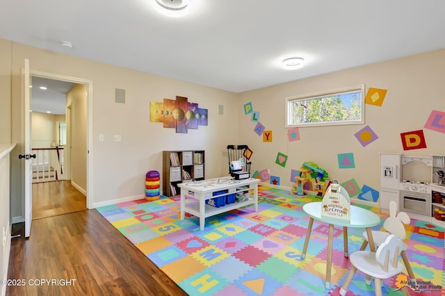 740 Botanical Heights Cir, Anchorage, AK 99515 - playroom featuring wood finished floors and baseboards