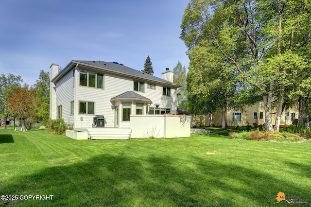 740 Botanical Heights Cir, Anchorage, AK 99515 - rear view of house with a chimney and a yard