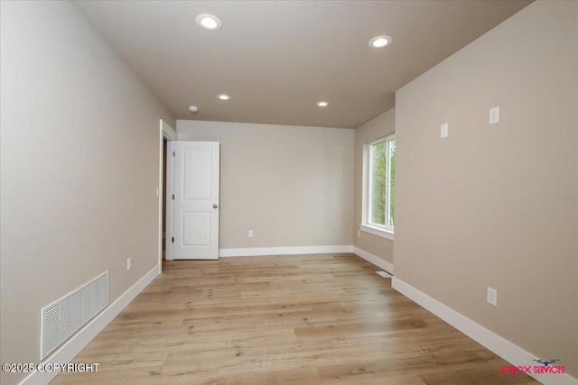 9089 E Spring Creek Cir, Palmer, AK 99645 - empty room with recessed lighting, baseboards, and light wood-style floors