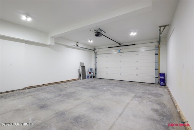 9089 E Spring Creek Cir, Palmer, AK 99645 - garage featuring a garage door opener