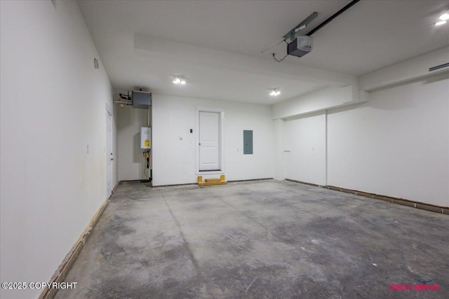 9089 E Spring Creek Cir, Palmer, AK 99645 - garage featuring a garage door opener and recessed lighting