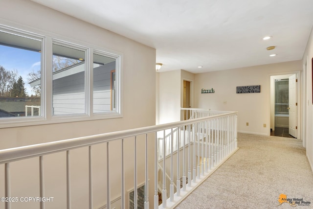 2447 Loussac Dr, Anchorage, AK 99517 - hall featuring recessed lighting, carpet floors, and baseboards
