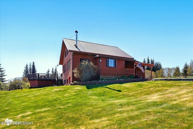 5301 N Glacier View Ct, Homer, AK 99603 - view of side of home featuring a yard and a wooden deck