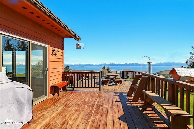 5301 N Glacier View Ct, Homer, AK 99603 - wooden terrace with a water view