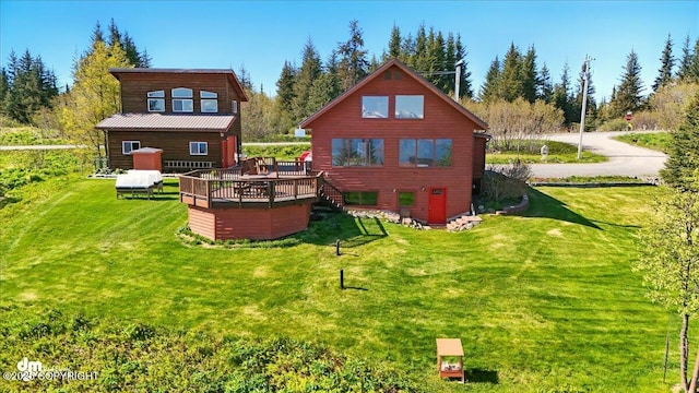 5301 N Glacier View Ct, Homer, AK 99603 - back of house featuring a deck and a yard