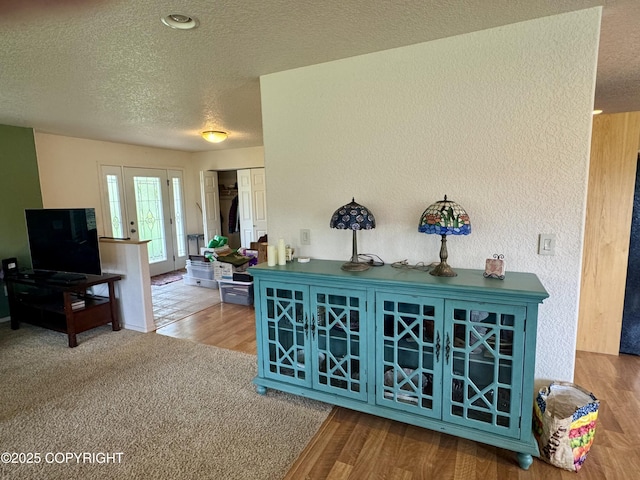 17110 E Kathy Cir, Palmer, AK 99645 - living room with a textured ceiling, a textured wall, and wood finished floors