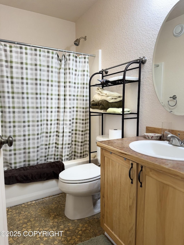 17110 E Kathy Cir, Palmer, AK 99645 - full bathroom featuring a textured wall, shower / bath combo, vanity, and toilet