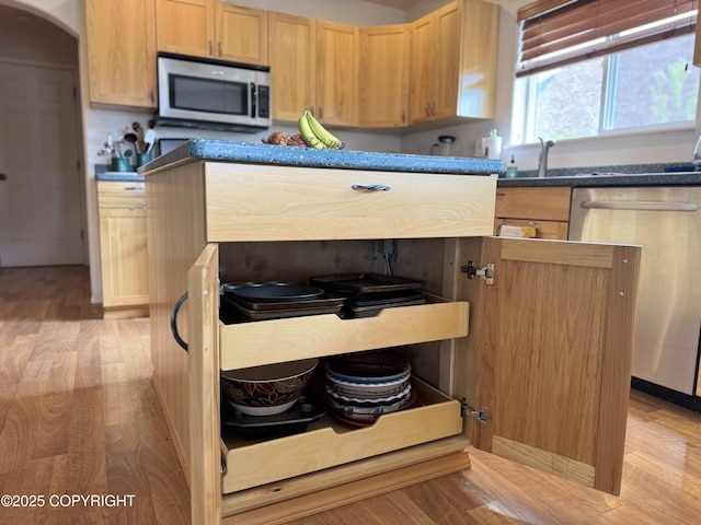 17110 E Kathy Cir, Palmer, AK 99645 - kitchen with stainless steel appliances, light wood-type flooring, and light brown cabinetry