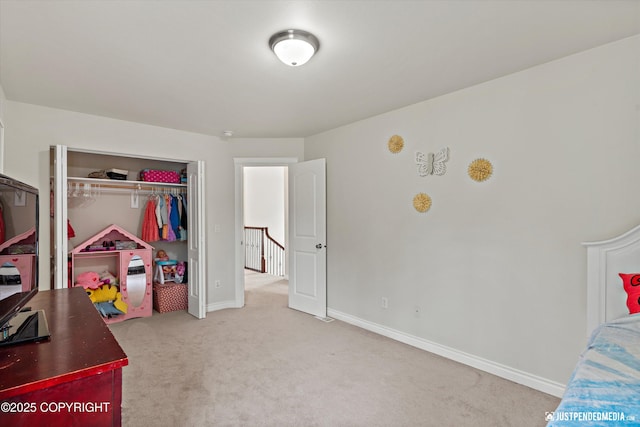 1675 E Pintail Dr, Wasilla, AK 99645 - carpeted bedroom with a closet and baseboards