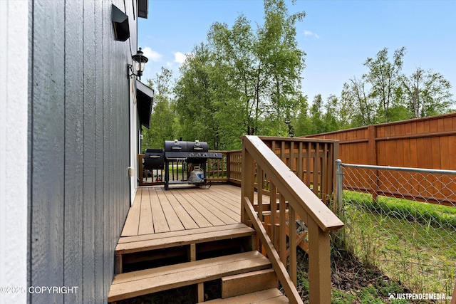 1675 E Pintail Dr, Wasilla, AK 99645 - wooden terrace featuring a grill