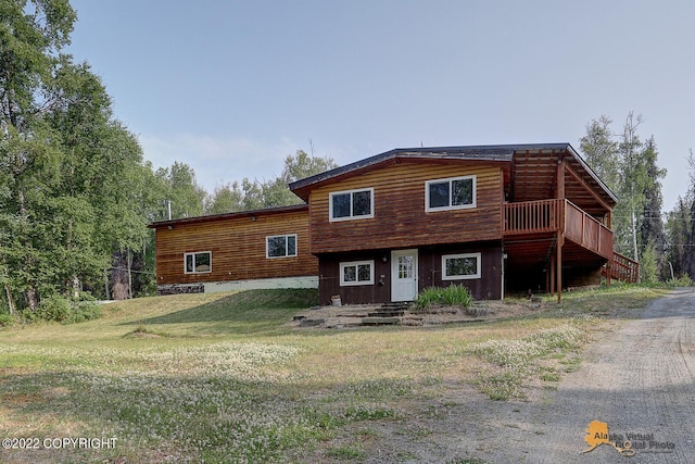 8301 W Lost Valley Rd, Wasilla, AK 99623 - view of front of house featuring a front lawn