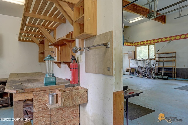 8301 W Lost Valley Rd, Wasilla, AK 99623 - kitchen with open shelves and concrete floors