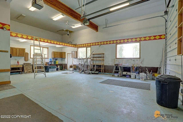 8301 W Lost Valley Rd, Wasilla, AK 99623 - garage featuring a garage door opener