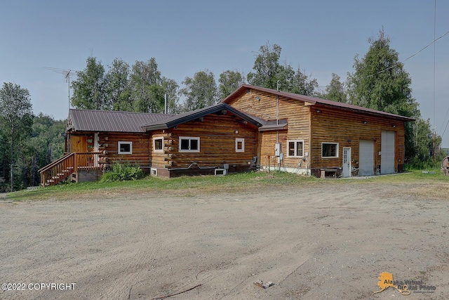 8301 W Lost Valley Rd, Wasilla, AK 99623 - view of property exterior featuring metal roof