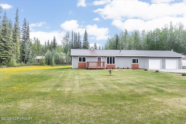 3432 Conifer Dr, North Pole, AK 99705 - single story home with an attached garage, a front lawn, a wooden deck, and driveway