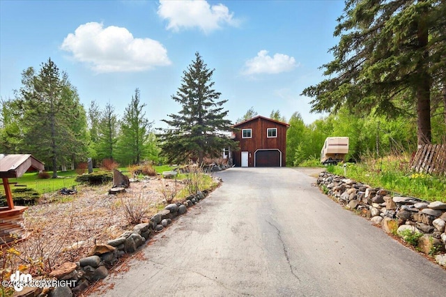 650 N Esty Dr, Palmer, AK 99645 - view of front of property featuring asphalt driveway and a detached garage