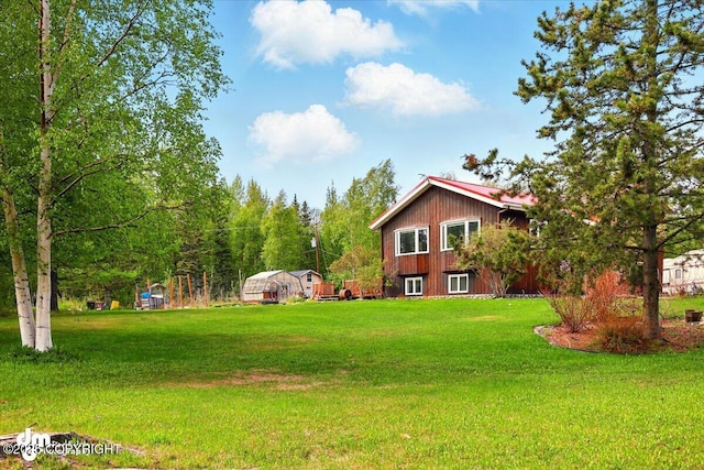 650 N Esty Dr, Palmer, AK 99645 - view of grassy yard with an outdoor structure