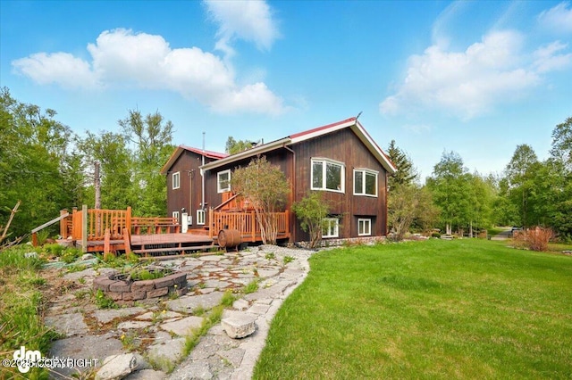 650 N Esty Dr, Palmer, AK 99645 - rear view of property with a deck and a yard