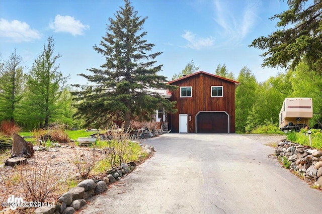 650 N Esty Dr, Palmer, AK 99645 - view of property exterior with asphalt driveway