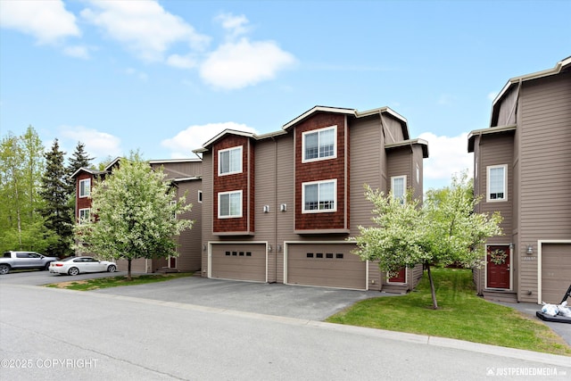12621 Bona Kim Loop # 4, Anchorage, AK 99515 - multi unit property featuring driveway and an attached garage