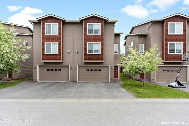 12621 Bona Kim Loop # 4, Anchorage, AK 99515 - multi unit property featuring asphalt driveway and an attached garage