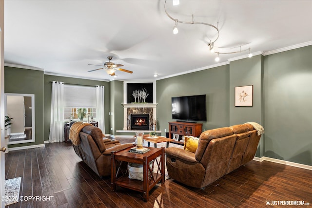 12621 Bona Kim Loop # 4, Anchorage, AK 99515 - living room with a stone fireplace, ceiling fan, dark wood-type flooring, baseboards, and crown molding