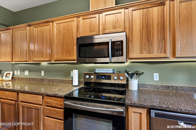 12621 Bona Kim Loop # 4, Anchorage, AK 99515 - kitchen with appliances with stainless steel finishes and dark stone counters
