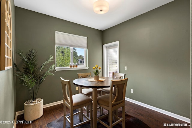 12621 Bona Kim Loop # 4, Anchorage, AK 99515 - dining area with wood finished floors and baseboards