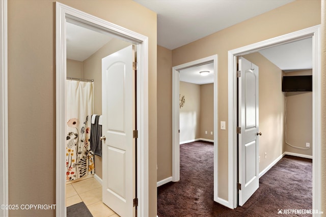 12621 Bona Kim Loop # 4, Anchorage, AK 99515 - hall featuring baseboards and carpet floors
