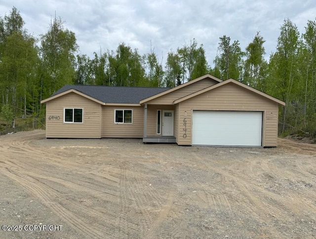 6940 W Werner Dr, Wasilla, AK 99654 - view of front of property featuring driveway and a garage