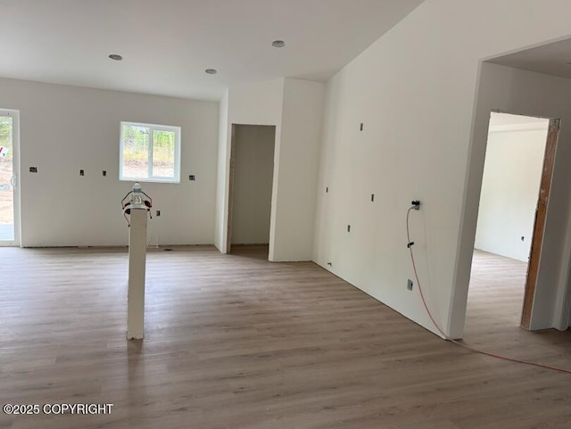 6940 W Werner Dr, Wasilla, AK 99654 - unfurnished living room featuring light wood-style floors