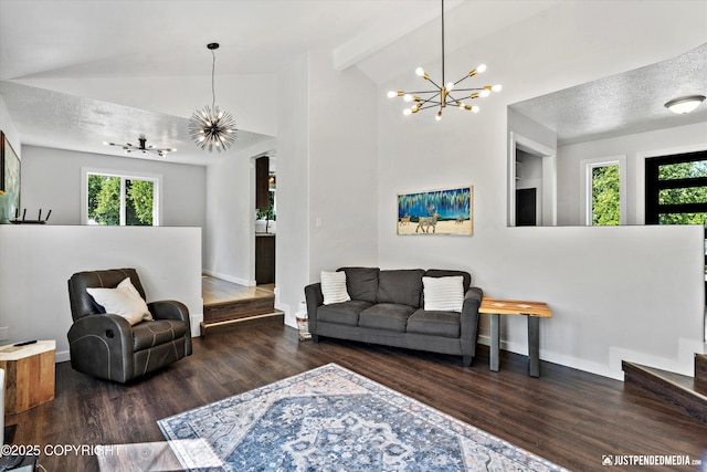 1551 S Oat St, Wasilla, AK 99654 - living area with a chandelier, healthy amount of natural light, wood finished floors, baseboards, and a textured ceiling