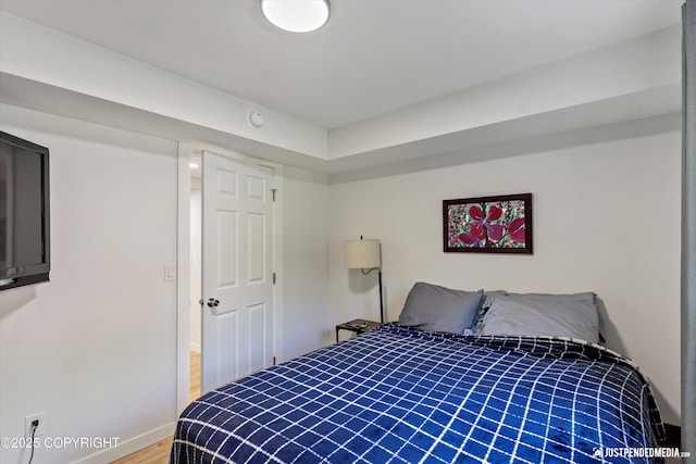 1551 S Oat St, Wasilla, AK 99654 - bedroom with wood finished floors and baseboards
