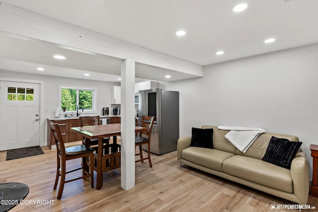 1551 S Oat St, Wasilla, AK 99654 - dining area with light wood-style floors and recessed lighting