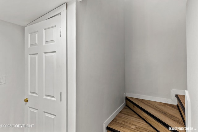 1551 S Oat St, Wasilla, AK 99654 - stairs featuring baseboards and wood finished floors