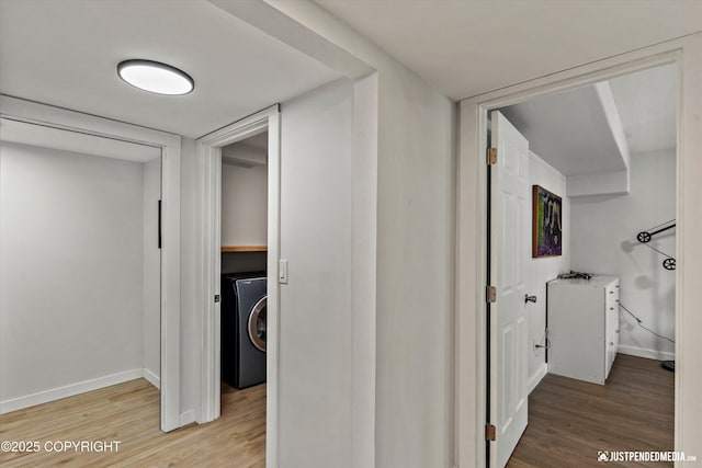 1551 S Oat St, Wasilla, AK 99654 - hall with washer / clothes dryer, light wood-style floors, and baseboards