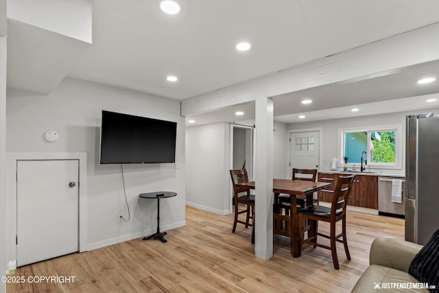 1551 S Oat St, Wasilla, AK 99654 - dining area featuring recessed lighting, light wood-style floors, and baseboards