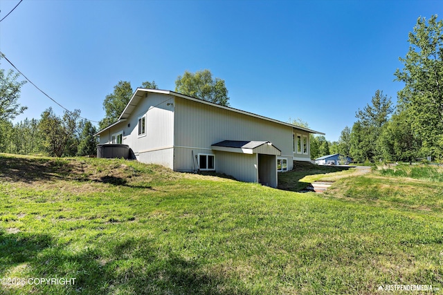 1551 S Oat St, Wasilla, AK 99654 - view of property exterior with a yard