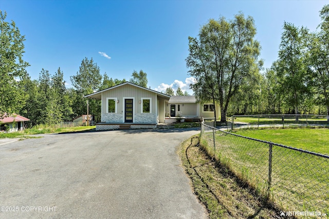 1551 S Oat St, Wasilla, AK 99654 - view of front of home with asphalt driveway and board and batten siding