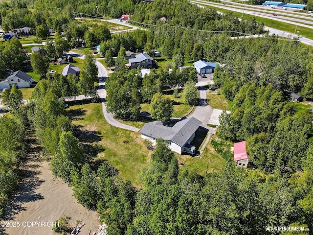 1551 S Oat St, Wasilla, AK 99654 - aerial view of property and surrounding area featuring a forest