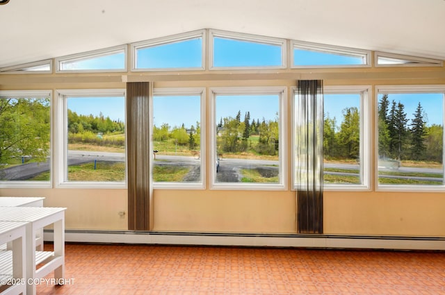 7101 Omalley Rd, Anchorage, AK 99507 - unfurnished sunroom featuring baseboard heating and lofted ceiling