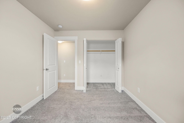 12248 Vista Ridge Loop # 30, Eagle River, AK 99577 - unfurnished bedroom with carpet and a closet