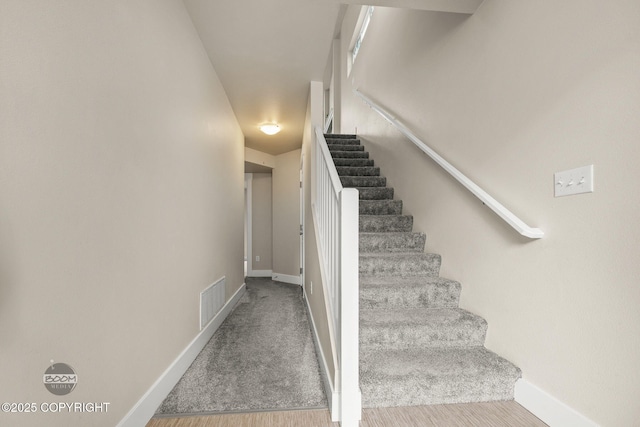 12248 Vista Ridge Loop # 30, Eagle River, AK 99577 - stairway featuring baseboards
