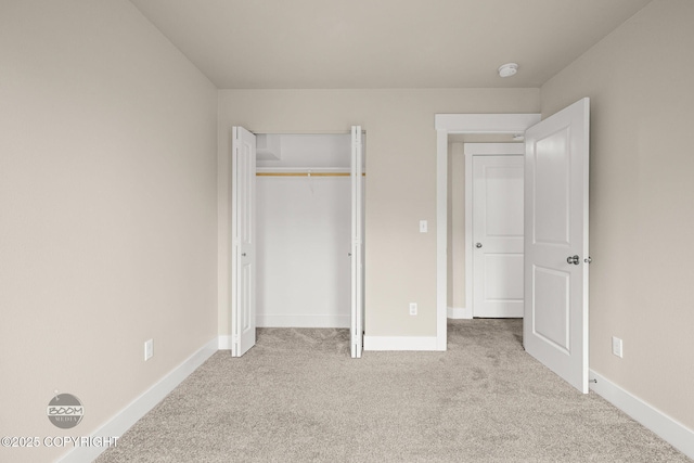 12248 Vista Ridge Loop # 30, Eagle River, AK 99577 - unfurnished bedroom featuring carpet floors and a closet